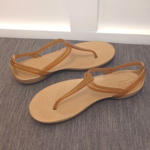 Crocs sandals women's size 6, gold/tan